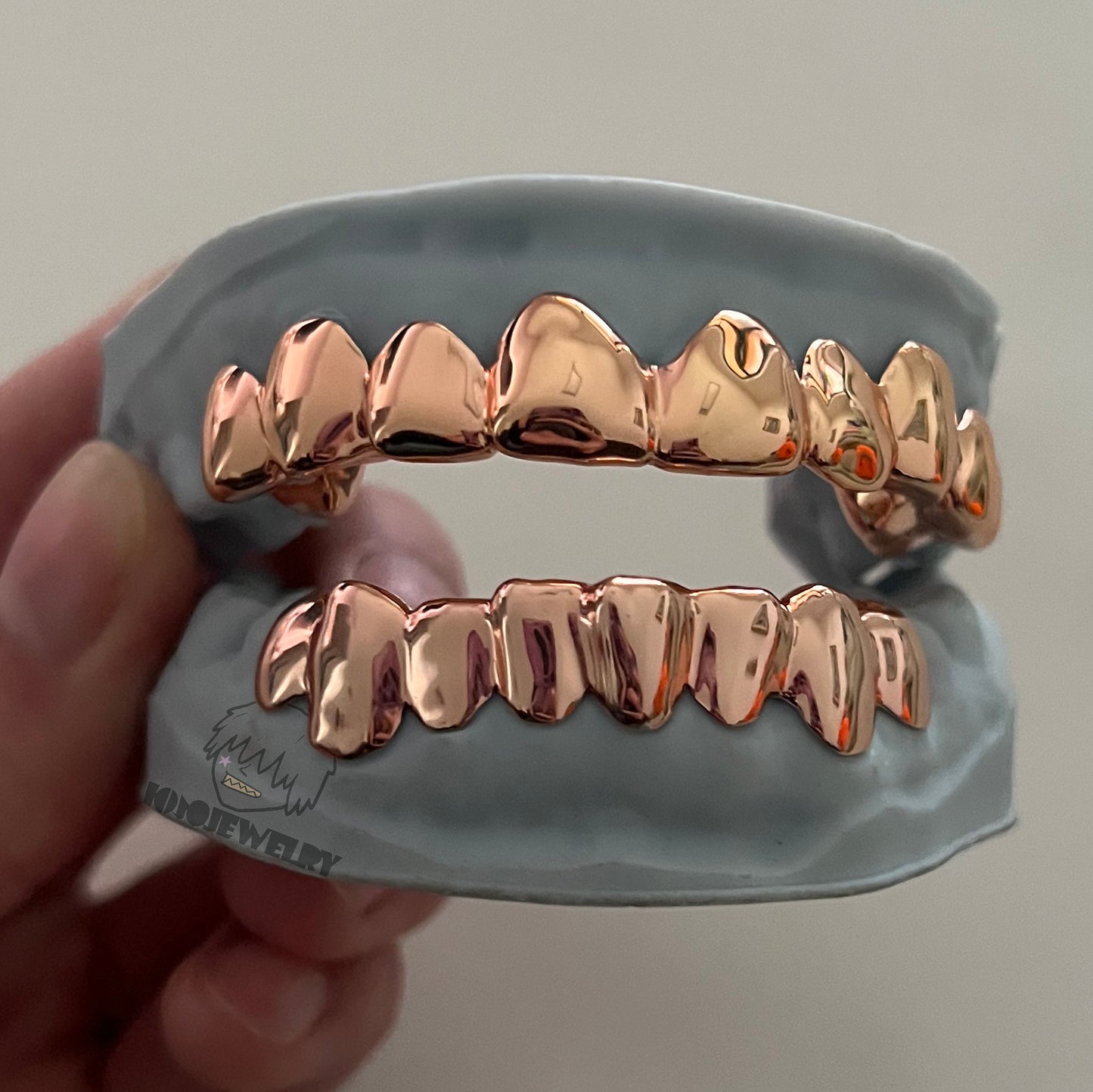 Rose Gold Grillz – Custom High Polish Tooth Grillz