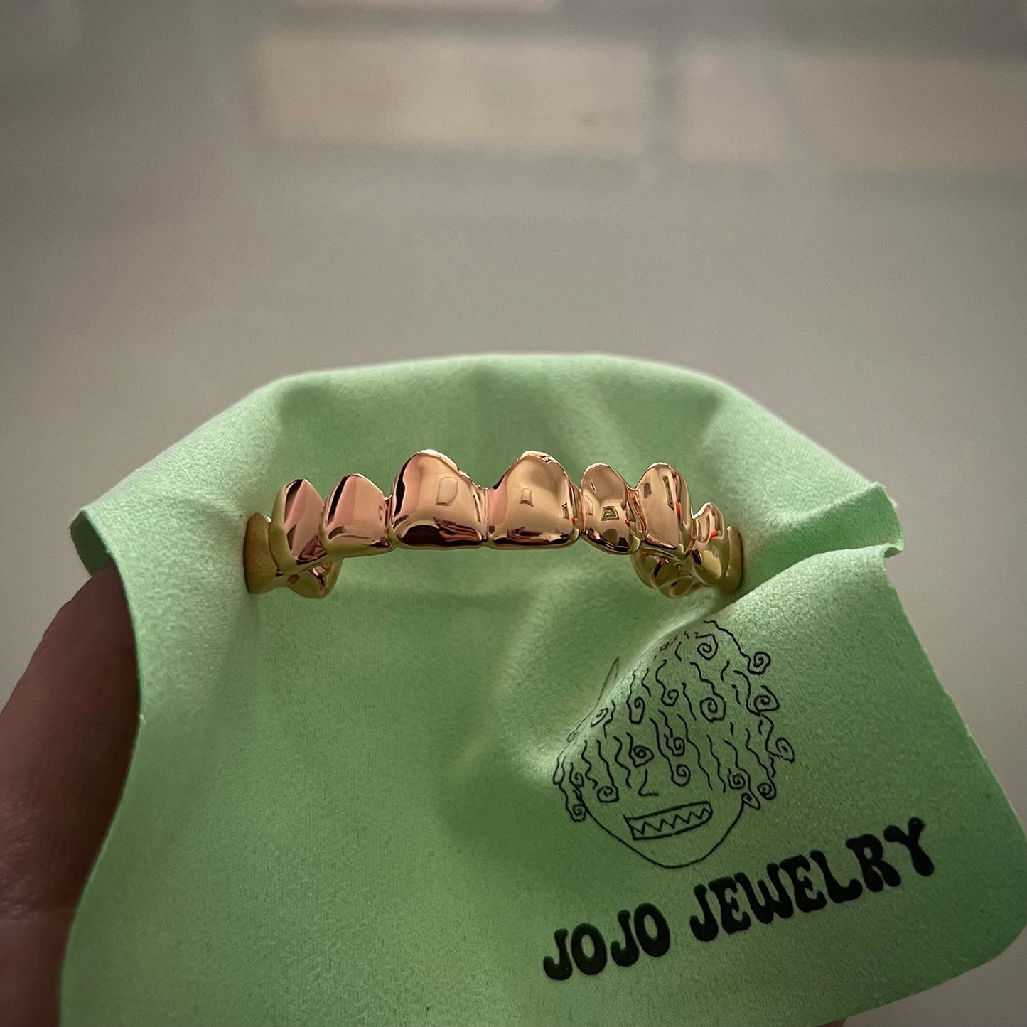 Rose Gold Grillz – Custom High Polish Tooth Grillz