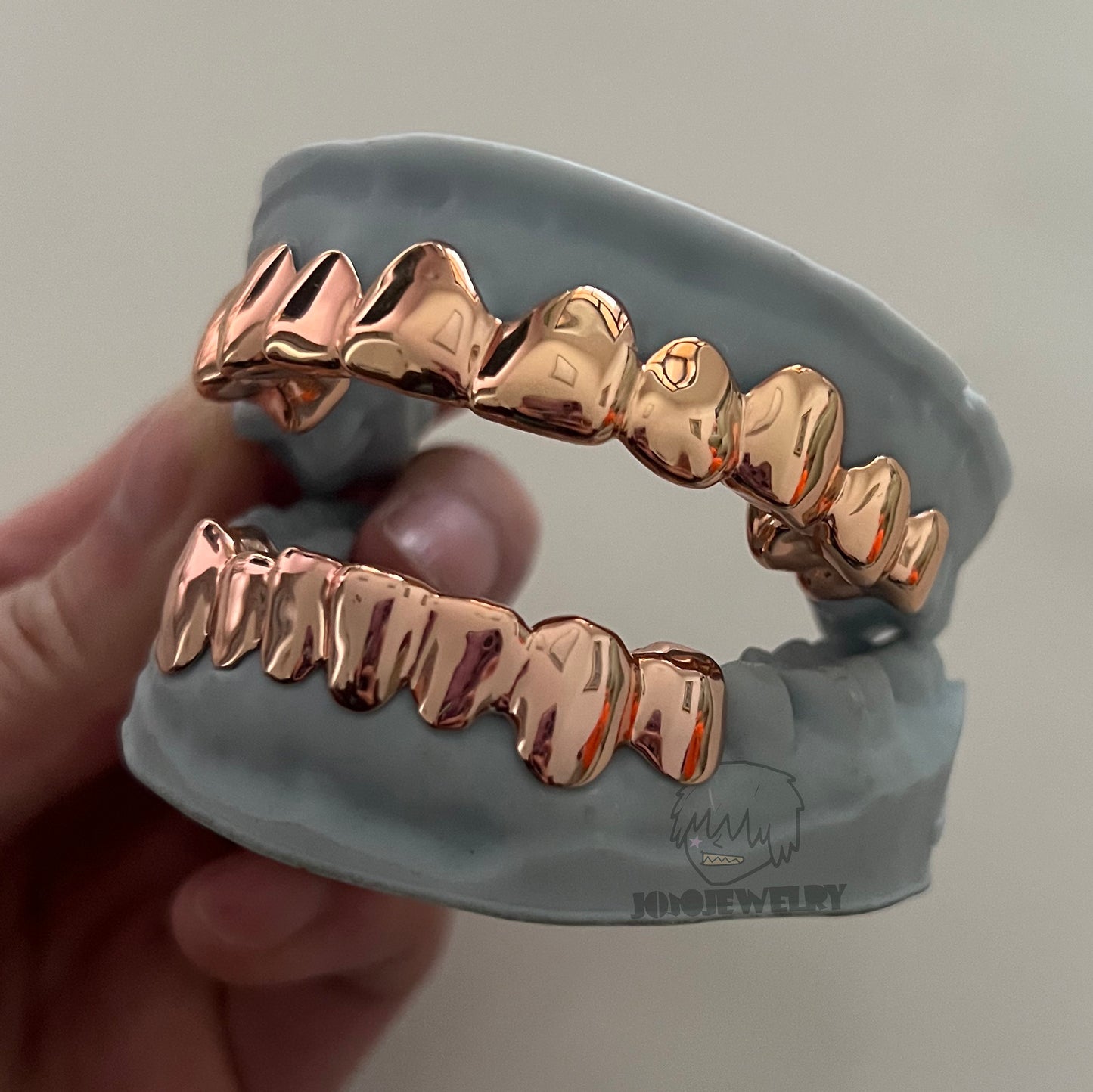 Rose Gold Grillz – Custom High Polish Tooth Grillz